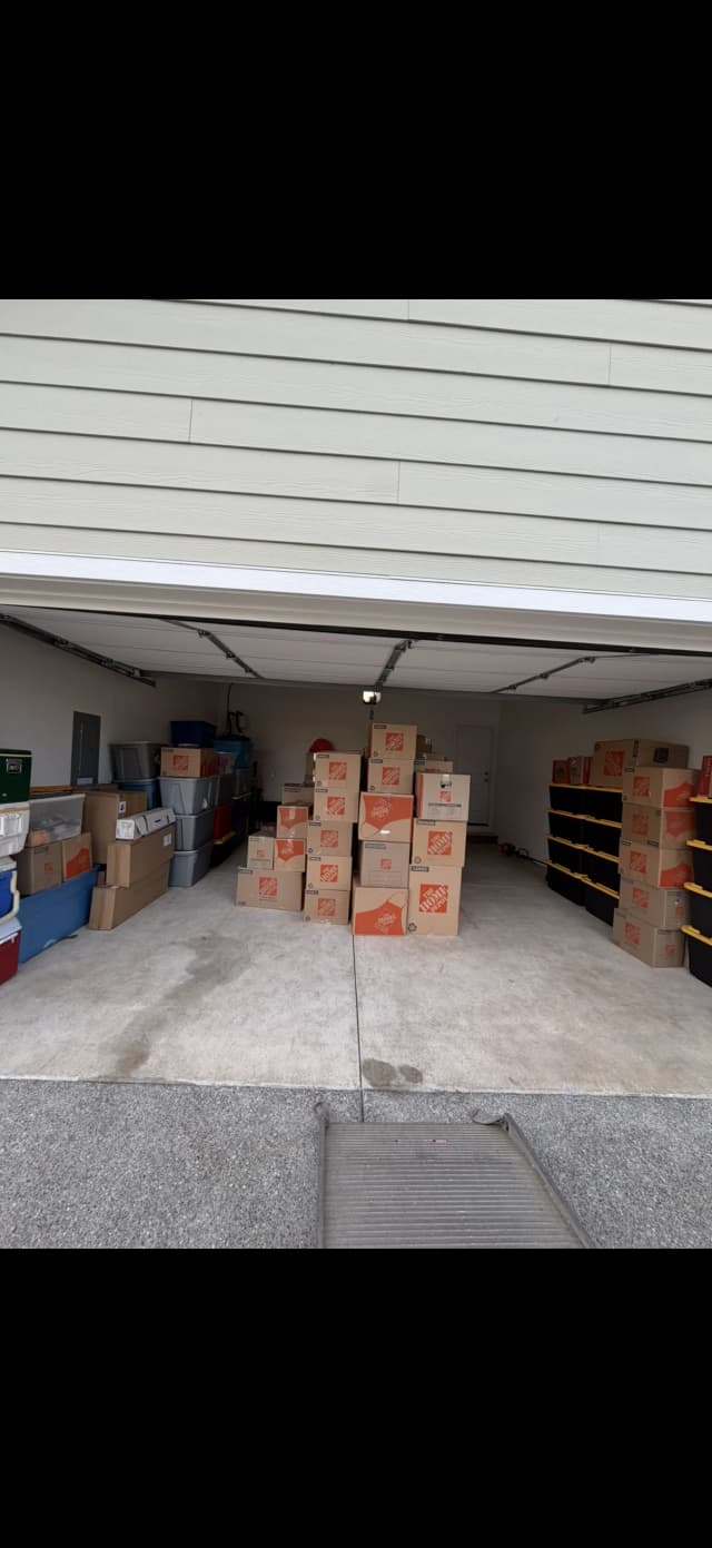 Garage staged with moving boxes ready for loading